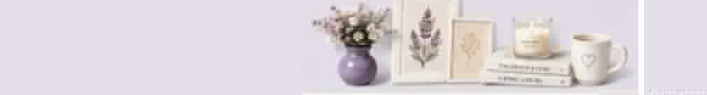 Lavender vase, botanical frames, candle, books and mug